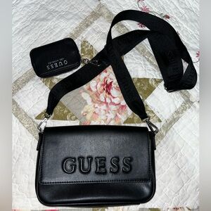 Guess crossbody black small purse. Only worn 3 times.